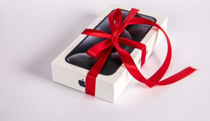 iPhone box wrapped with red ribbon bow