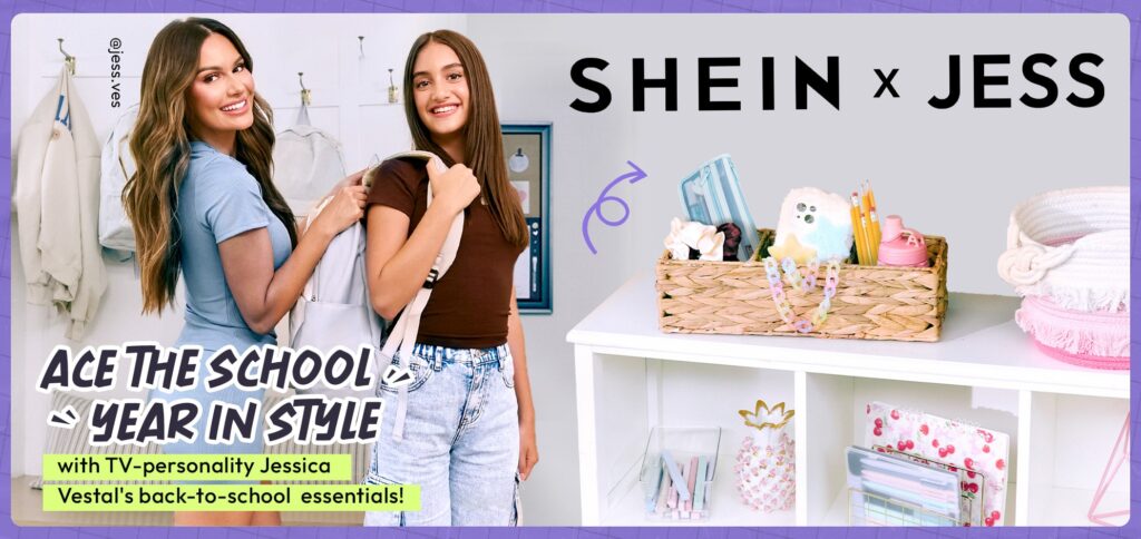 Two smiling girls with backpacks, school supplies nearby